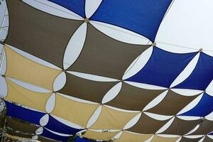 Cotton fabric  blue and white  used as the curves roof for decoration photo