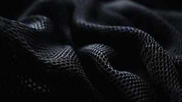 Black Fabric in Wavy Bokeh Abstract Background. photo