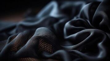 Black Fabric in Wavy Bokeh Abstract Background. photo