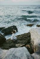 Beautiful woman in white dress at the sea beach relax photo