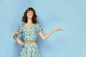 Pretty brunette smile gestures with hand Copy Space summer clothes photo