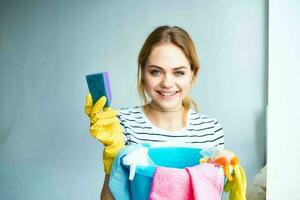 Cleaning lady in rubber gloves tools for washing home interior rendering services photo