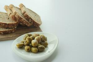 breads and Turkish Grilled olives on white background photo