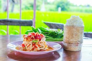 papaya salad with sticky rice photo