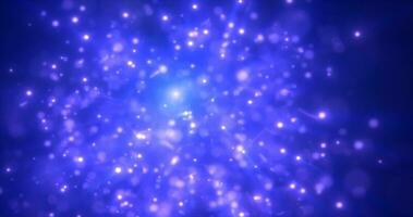 Abstract blue energy particles and dots glowing flying sparks festive with bokeh effect and blur background photo