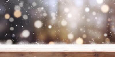 Snow falling on a wooden table photo