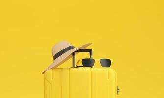 Close up of a Suitcase with sun glasses and hat on yellow background. Vacation concept. photo