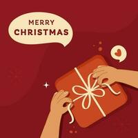 Merry Christmas Poster Design With Top View Of Hand Holding Ribbon Of Gift Box On Red Background. vector