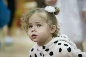 Portrait of a little girl two years old. photo