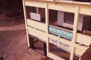 Rangpur, Bangladesh 2023.  Rooftop view of a Building.Beautiful landscape and architecture of Carmichael College,Rangpur.Side view of a Building or Flat.Modern School and University Building photo