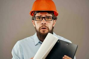 man in work uniform orange helmet service professional operation manual photo