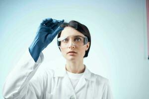 woman laboratory assistant analysis diagnostics technology research science photo