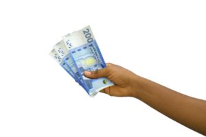 Fair hand holding 3D rendered Moroccan dirham notes isolated on transparent background png
