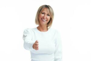 Picture of blonde woman giving hand isolated over white background photo