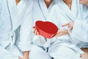 Picture of four girls wearing bathrobe with heart photo