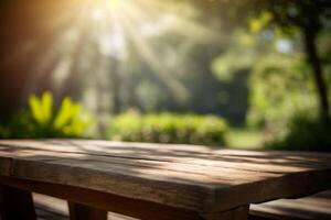 Empty wooden table in perspective for product display with blurred garden background. photo