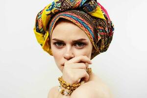 cheerful pretty woman multicolored turban african style close-up photo