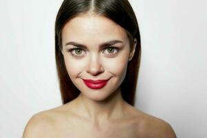 Woman close-up red lips bared shoulders attractive photo