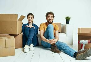 couple in love moving short tools potted flower man and woman photo