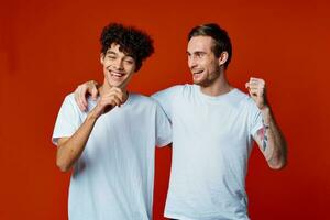 Two cheerful friends in white t-shirts communication photo