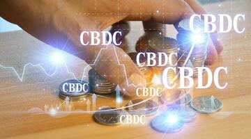 CBDC is a digital currency issued by a central bank. which has the ability to act as a medium to pay for goods and services can maintain value and is an accounting unit of measurement photo
