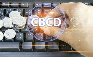 CBDC is a digital currency issued by a central bank. which has the ability to act as a medium to pay for goods and services can maintain value and is an accounting unit of measurement photo
