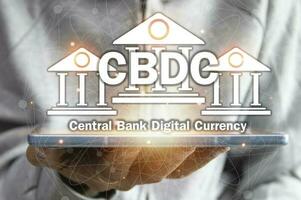 CBDC is a digital currency issued by a central bank. which has the ability to act as a medium to pay for goods and services can maintain value and is an accounting unit of measurement photo