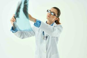 female doctor in white coat x-ray health diagnosis radiologist photo