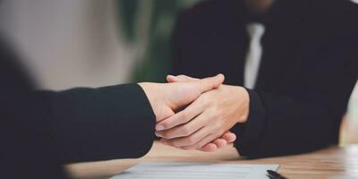 Businessmen shaking hands to indicate a business deal,successful contract management of the company,signing an agreement,business partner,New opportunities for the future of the industry,joint venture photo