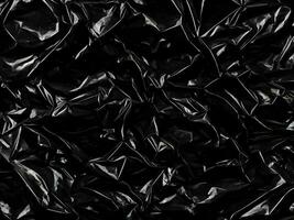 Sleek and Smooth Transparent Plastic Wrap Texture on Black Background photo