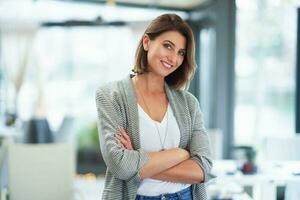 Portrait of mature young business woman in restaurant photo