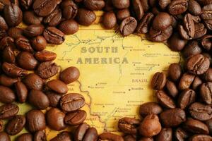 Coffee bean on world map, shopping online for export or import. photo