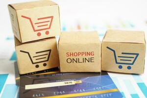 Online shopping, Shopping cart box with credit card , import export, finance commerce. photo