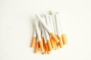 Cigarette, roll tobacco in paper with filter tube, No smoking concept. photo