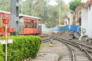 Kalka, India, March 16 2023 - View of Toy train Railway Tracks from the middle during daytime near Kalka railway station in India, Toy train track view, Indian Railway junction, Heavy industry photo