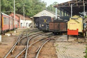 Kalka, India, March 16 2023 - View of Toy train Railway Tracks from the middle during daytime near Kalka railway station in India, Toy train track view, Indian Railway junction, Heavy industry photo