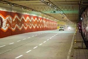 New Delhi, India, March 21 2023 - PM Narendra Modi dedicate Pragati tunnel and five underpass of Pragati Maidan Integrated Transit Corridor Project to nation, Pragati Tunnel opens for traffic movement photo