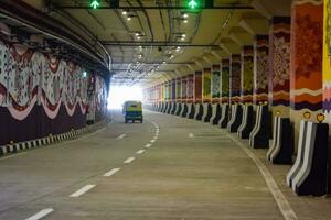 New Delhi, India, March 21 2023 - PM Narendra Modi dedicate Pragati tunnel and five underpass of Pragati Maidan Integrated Transit Corridor Project to nation, Pragati Tunnel opens for traffic movement photo