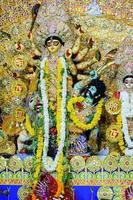 Goddess Durga with traditional look in close up view at a South Kolkata Durga Puja, Durga Puja Idol, A biggest Hindu Navratri festival in India photo