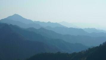 The beautiful mountains view from the top of the hill in spring photo