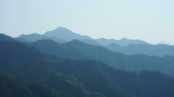 The beautiful mountains view from the top of the hill in spring photo