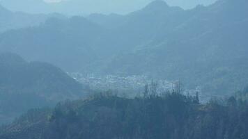 The beautiful mountains view from the top of the hill in spring photo