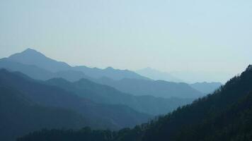 The beautiful mountains view from the top of the hill in spring photo