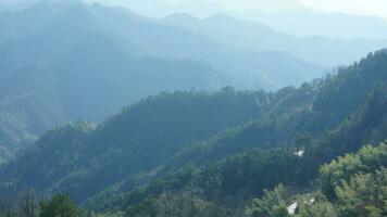 The beautiful mountains view from the top of the hill in spring photo