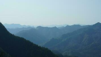 The beautiful mountains view from the top of the hill in spring photo