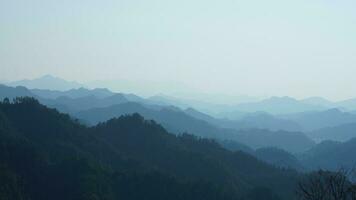 The beautiful mountains view from the top of the hill in spring photo