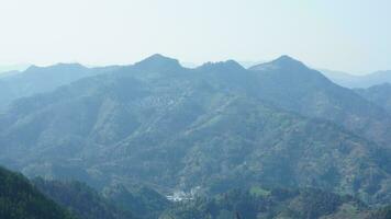 The beautiful mountains view from the top of the hill in spring photo