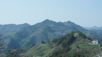 The beautiful mountains view from the top of the hill in spring photo