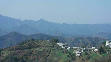 The beautiful mountains view from the top of the hill in spring photo