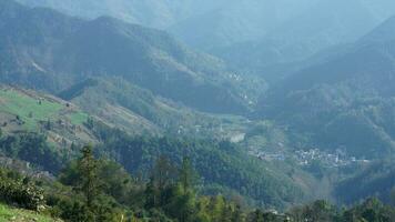 The beautiful mountains view from the top of the hill in spring photo